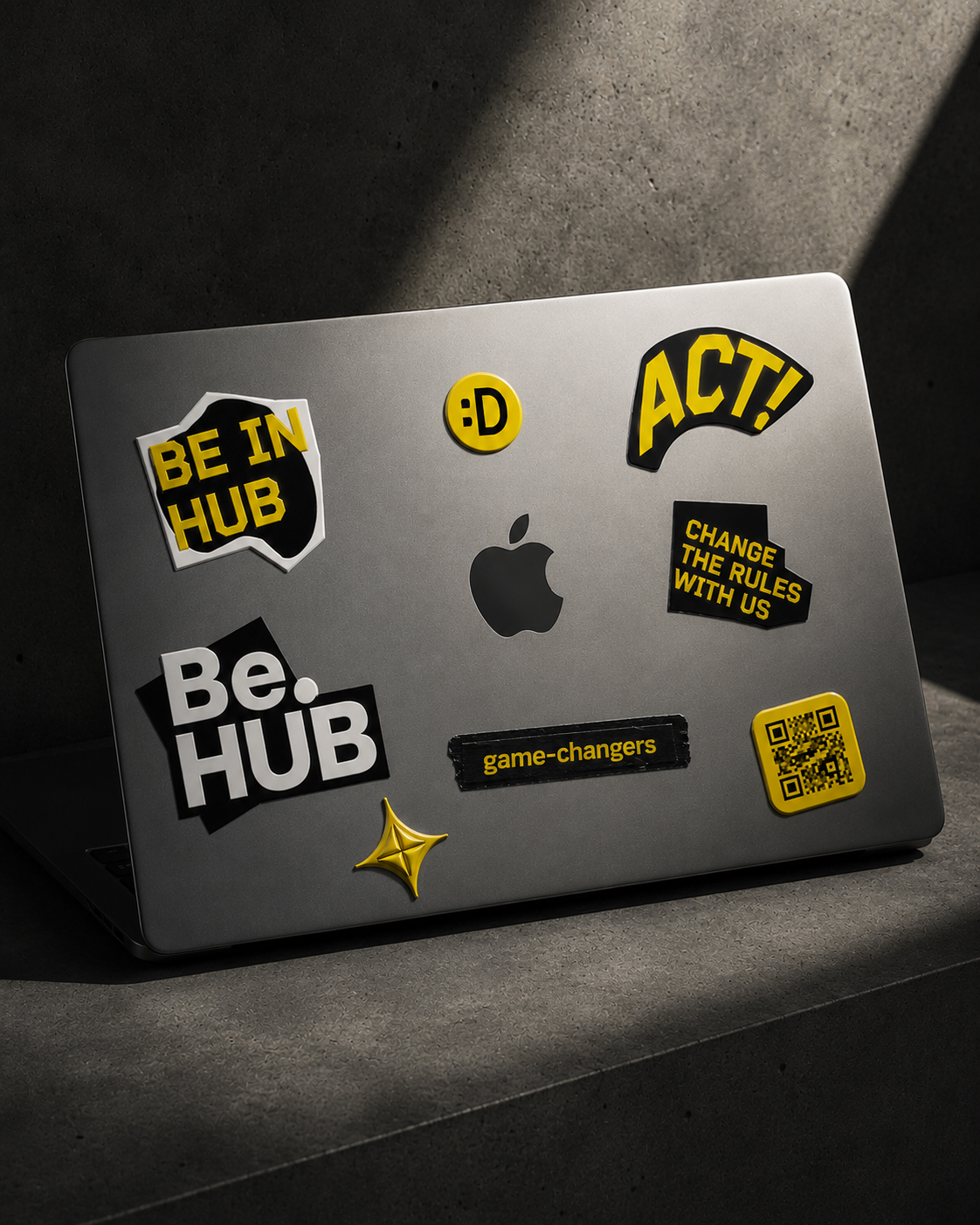 BE.HUB stickers on a laptop
